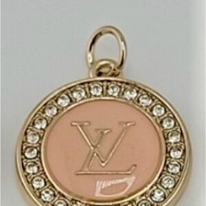 2 Piece Set: 
*Auth. Pull tag Louis Vuitton-Gold and Pink with crystals 
*chain